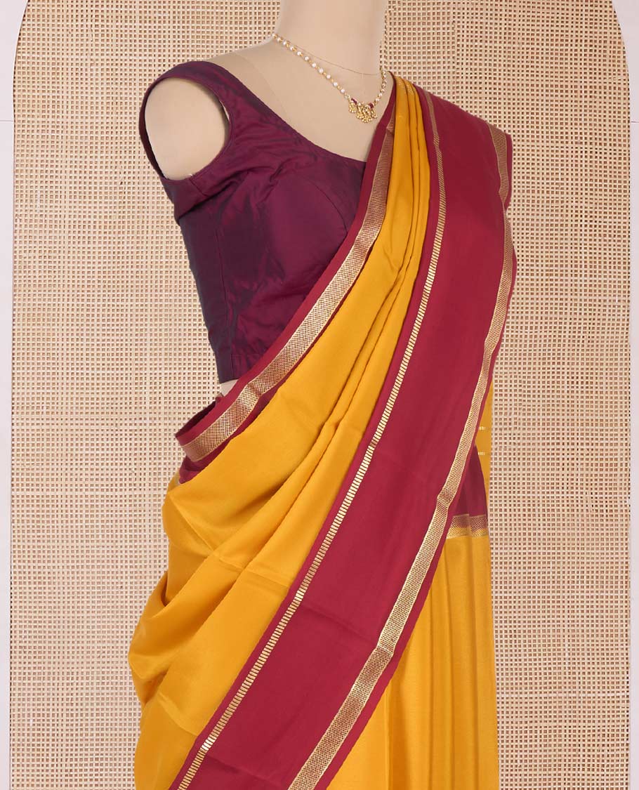 Yellow plain Mysore silk saree, contrast traditional zari border and pallu of zari designs
