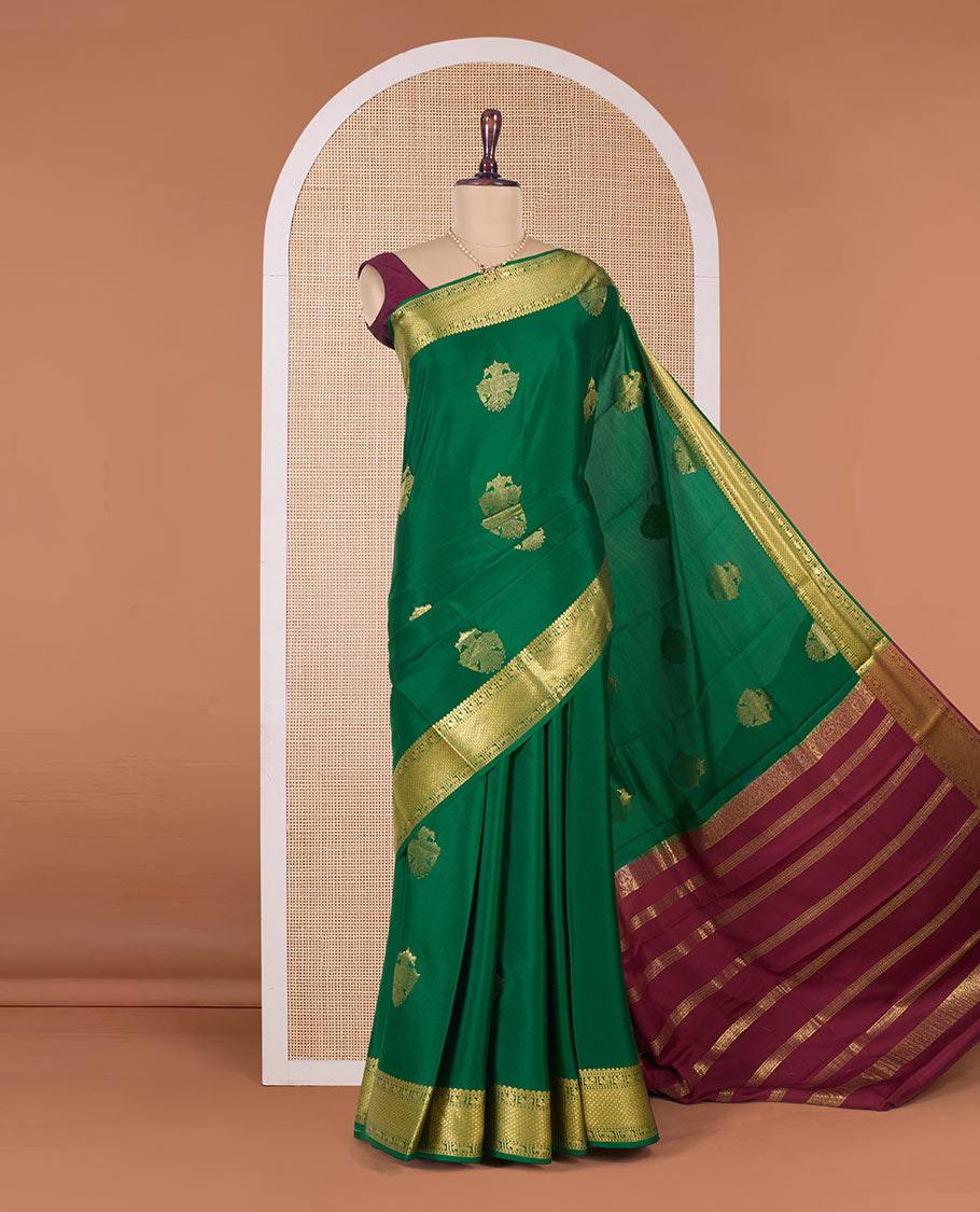 Green two-headed eagle motifs zari woven Mysore silk saree, traditional zari border, and contrast intricate pallu
