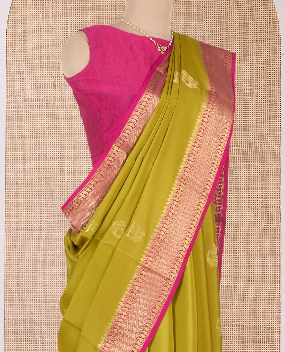 Green peacock motifs zari woven Mysore silk saree, contrast traditional zari border, and intricately designed pallu
