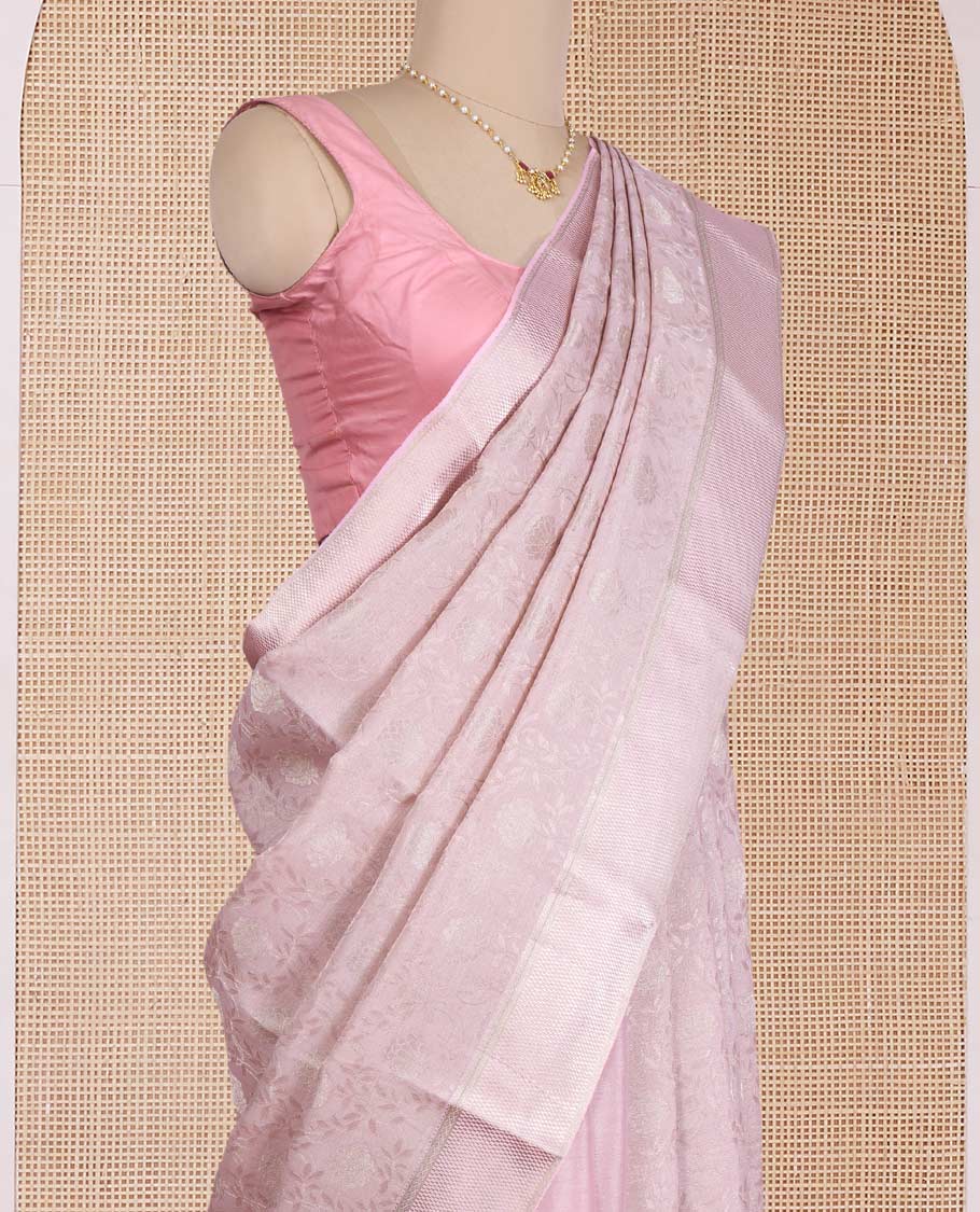 Peach floral jacquard Mysore silk saree, traditional zari border, and zari-rich jaal pallu