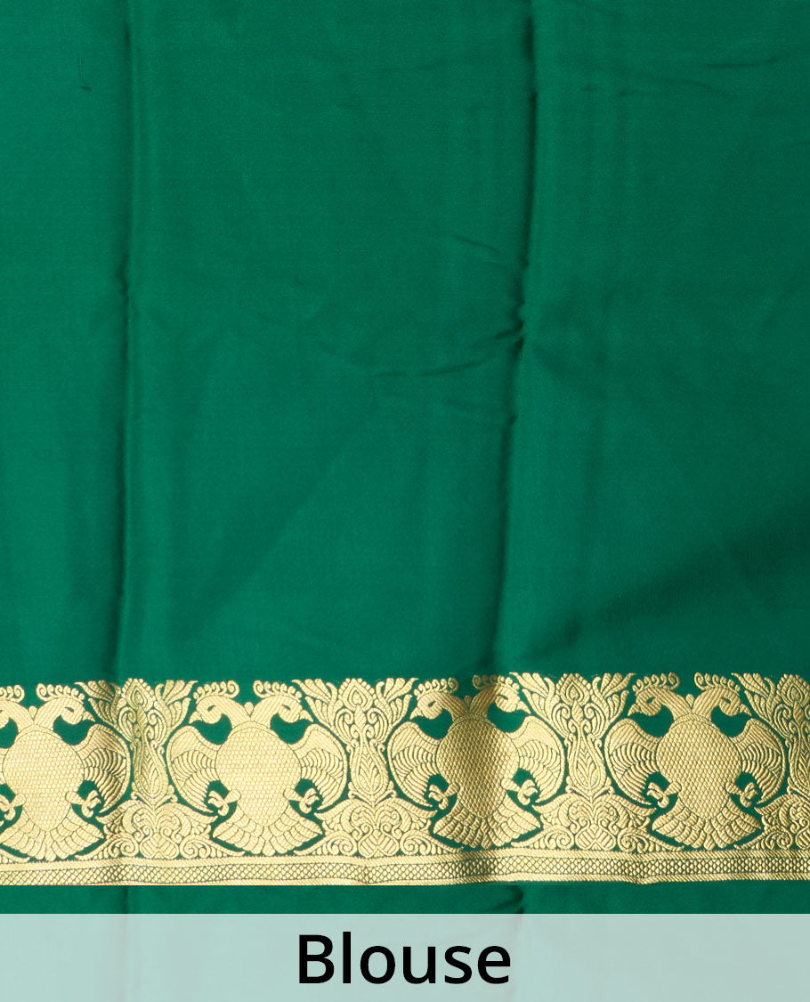 Red plain Mysore silk saree, contrast zari border of two-headed eagle motifs, and pallu steeped with two-headed eagle motifs