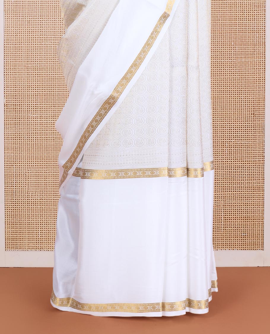 Cream round peacock chakram Mysore silk saree, traditional zari motifs woven border, and pallu of temple designs