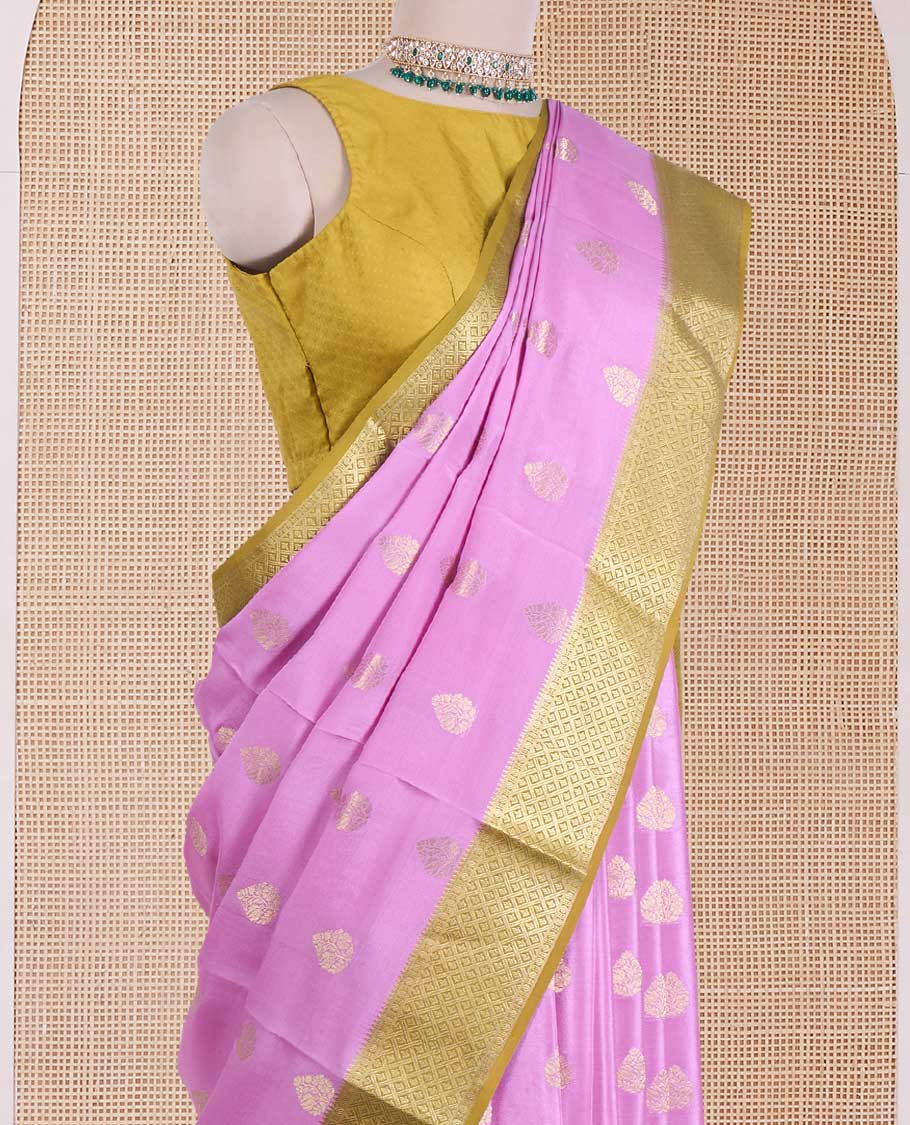 Pink zari buttas Mysore silk saree, contrast jaal border, and pallu steeped with traditional zari designs