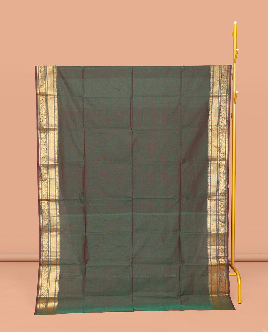 Green Plain Chettinad Cotton Saree, Complemented by a Contrast Traditional Zari Design Border, Subtly Striped Pallu, and Paired with a Matching Blouse