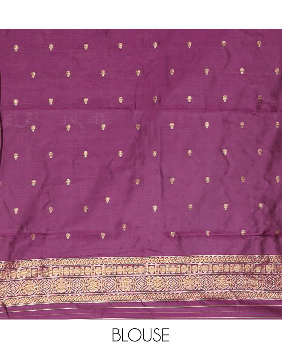 Dusky Pastel Green Kanchi Silk Saree, Elegantly Highlighted with Floral Zari Buttas All Over Its Body, Complemented by Contrast Floral Design Border, Intricately Designed Pallu, and Paired with a Contrast Blouse