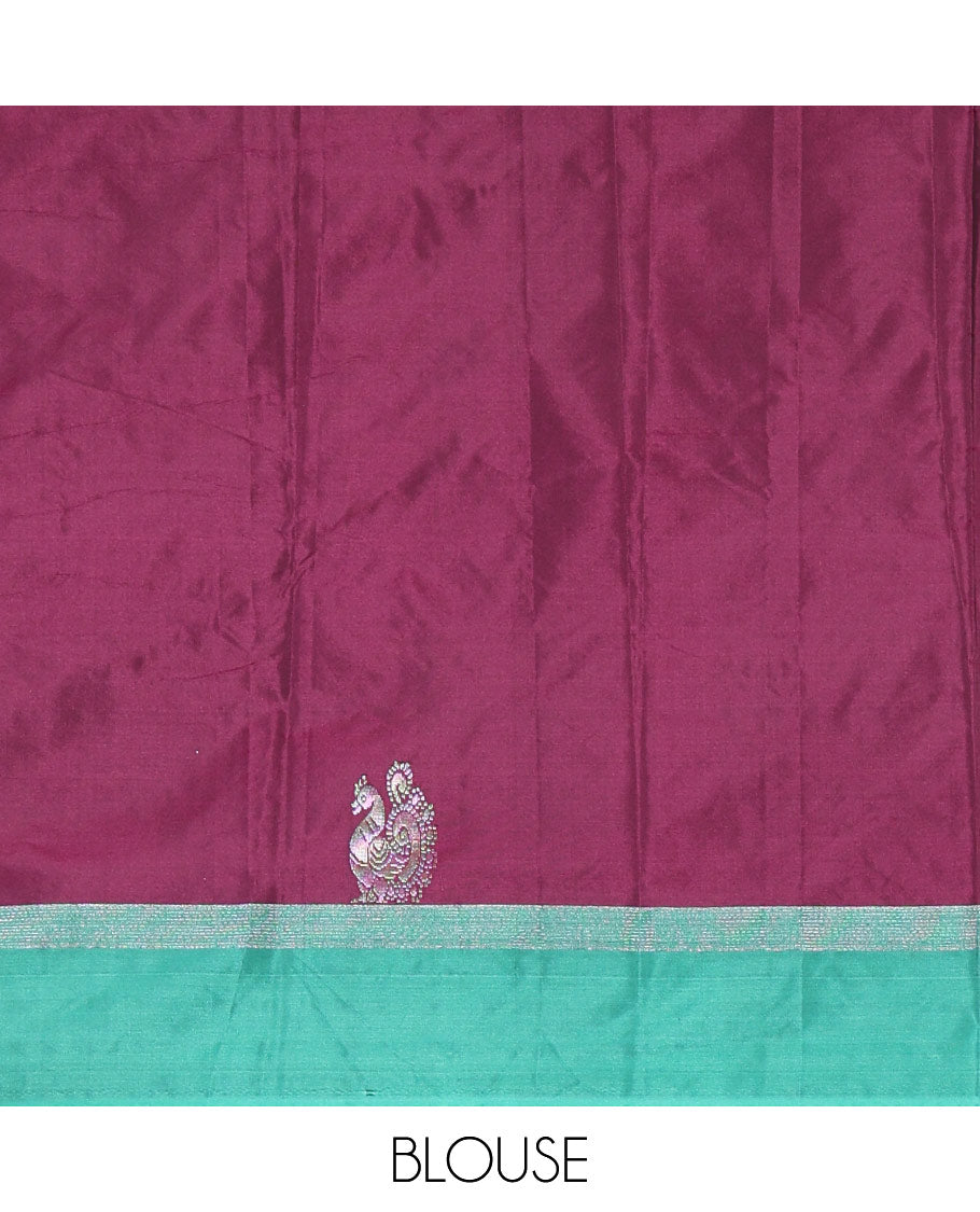 Purple dobby and peacock buttas semi-soft silk saree, contrast zari striped border, zari buttas pallu, and a matching blouse
