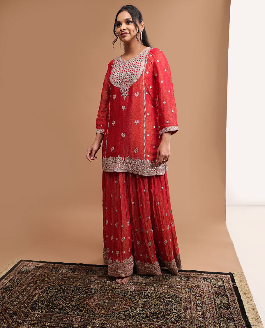 Red floral embroidery round neck, 3/4 th sleeve , knee length with sharara pants & embroidered dupatta