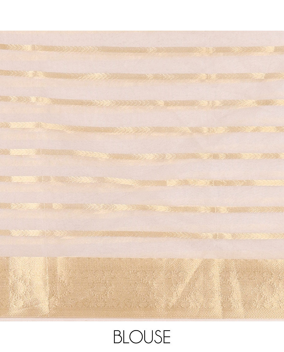 Half-white zari leaf vine design semi-organza saree, traditional zari design border, zari striped pallu, and a matching blouse