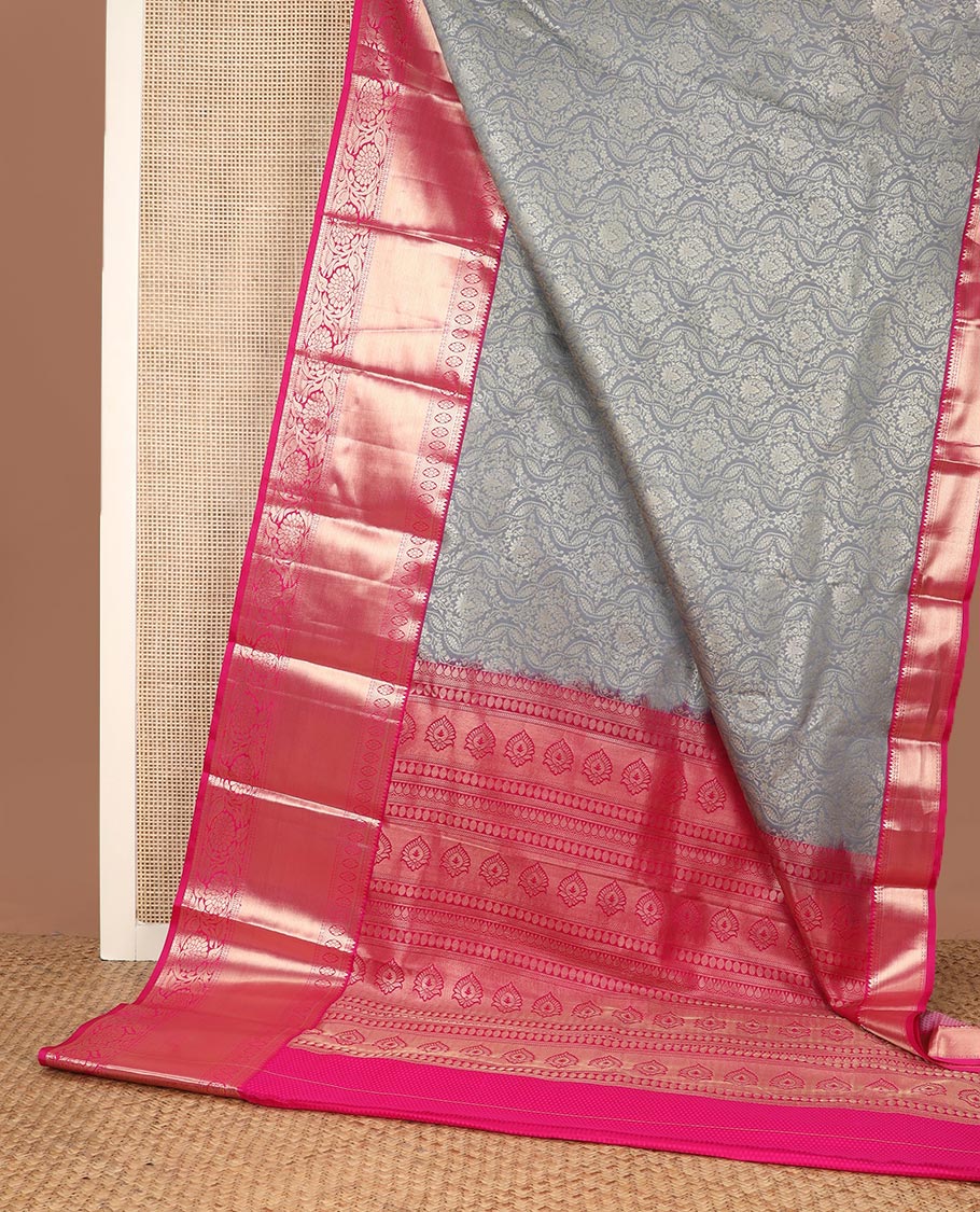 Grey floral jacquard budget silk saree, contrast traditional zari border, and traditional motifs steeped pallu