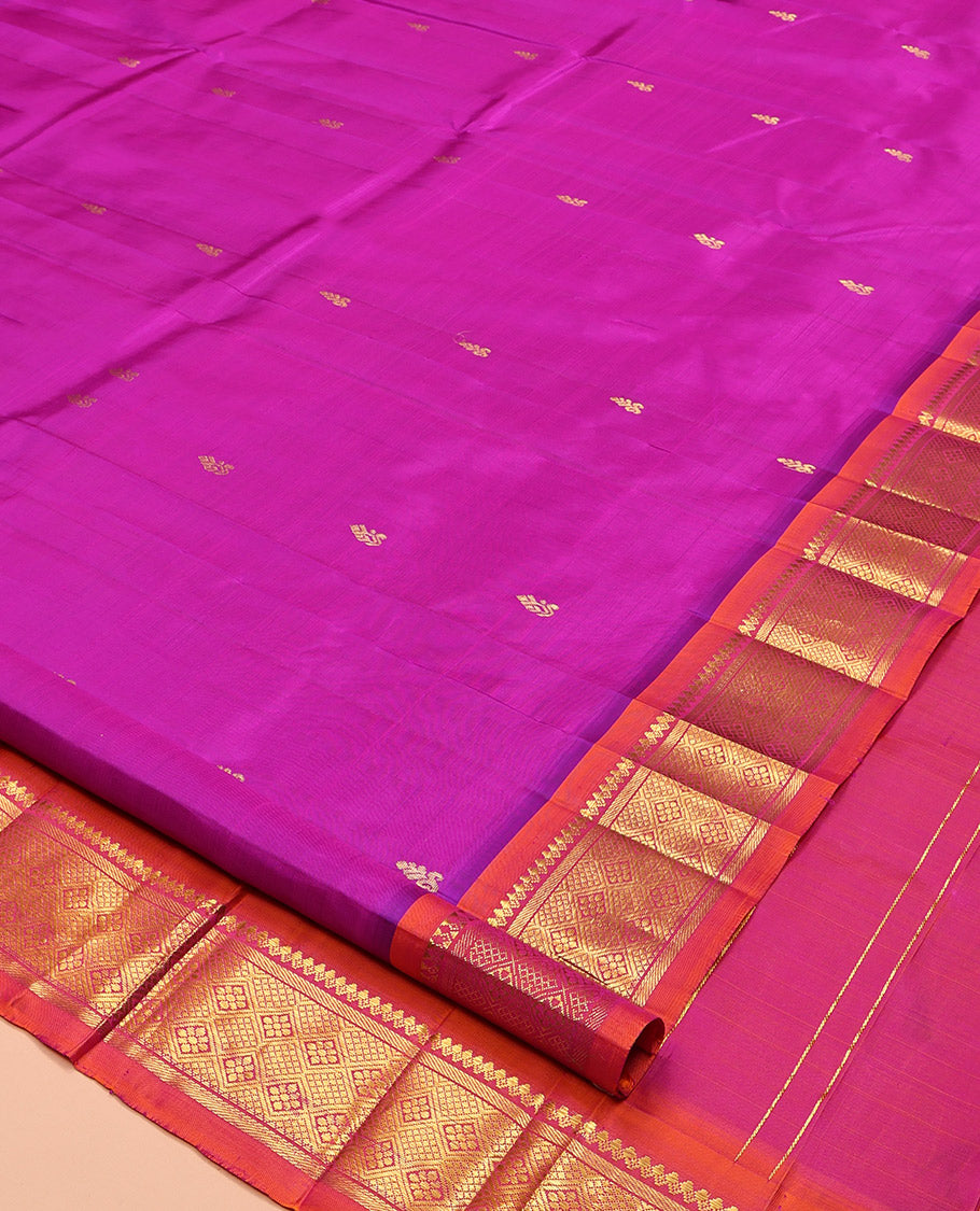 Pink Kanchipuram Silk Saree, Embellished with Zari Buttas, Complemented by a Contrast One-Sided Border of Thilakam Mokku, Banaras, and Jaal Designs, Zari Design Pallu, and No Blouse