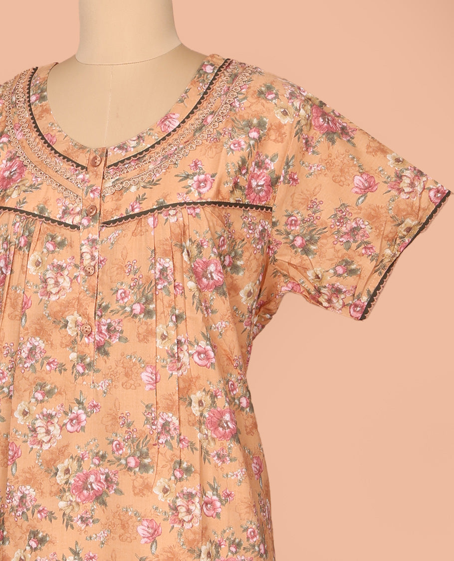 Orange Cotton Nighty Decked Up with Floral Print, Featuring Lace Work, Round Front Neck, and Half Sleeves