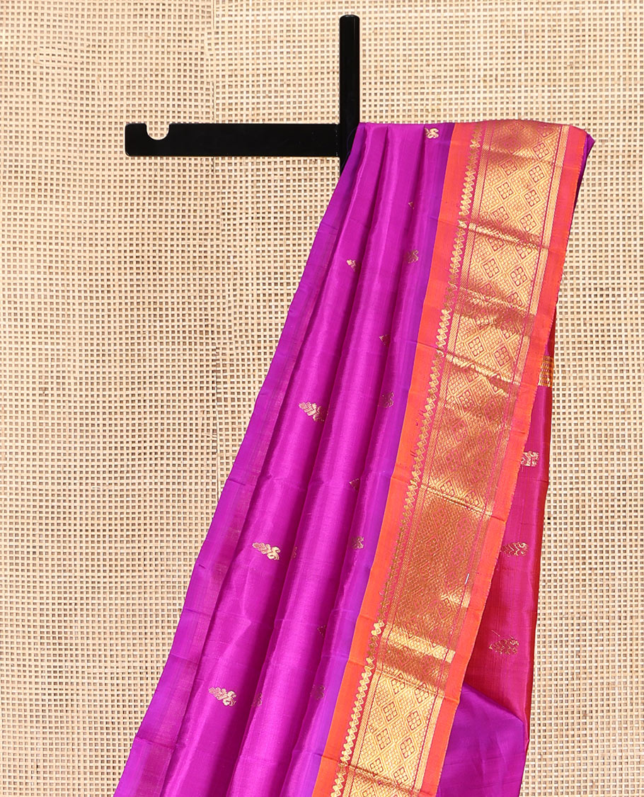 Pink Kanchipuram Silk Saree, Embellished with Zari Buttas, Complemented by a Contrast One-Sided Border of Thilakam Mokku, Banaras, and Jaal Designs, Zari Design Pallu, and No Blouse