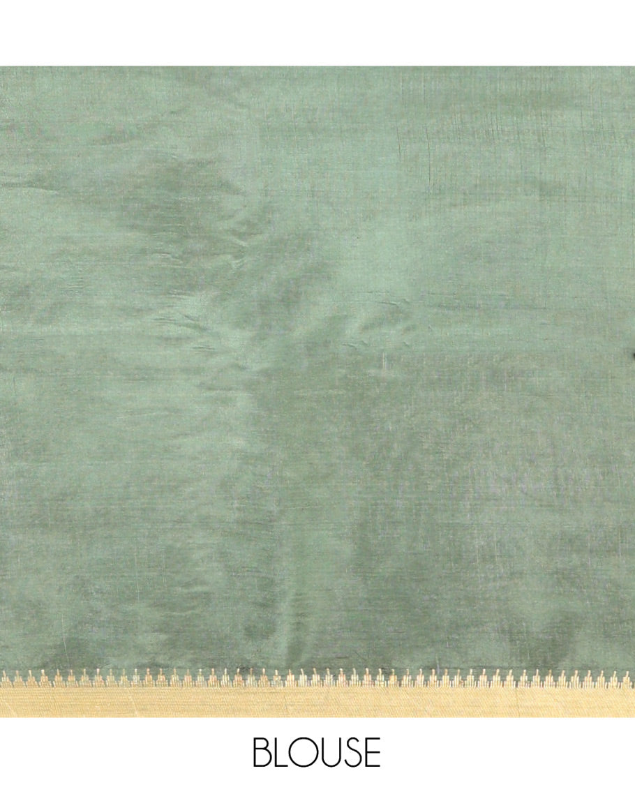 Green Banana Pith Saree, Sparsely Sparkled with Square Buttas All Over Its Body, Highlighted by a Zari Temple Border, Gleaming Zari Striped Pallu, and Paired with a Matching Blouse