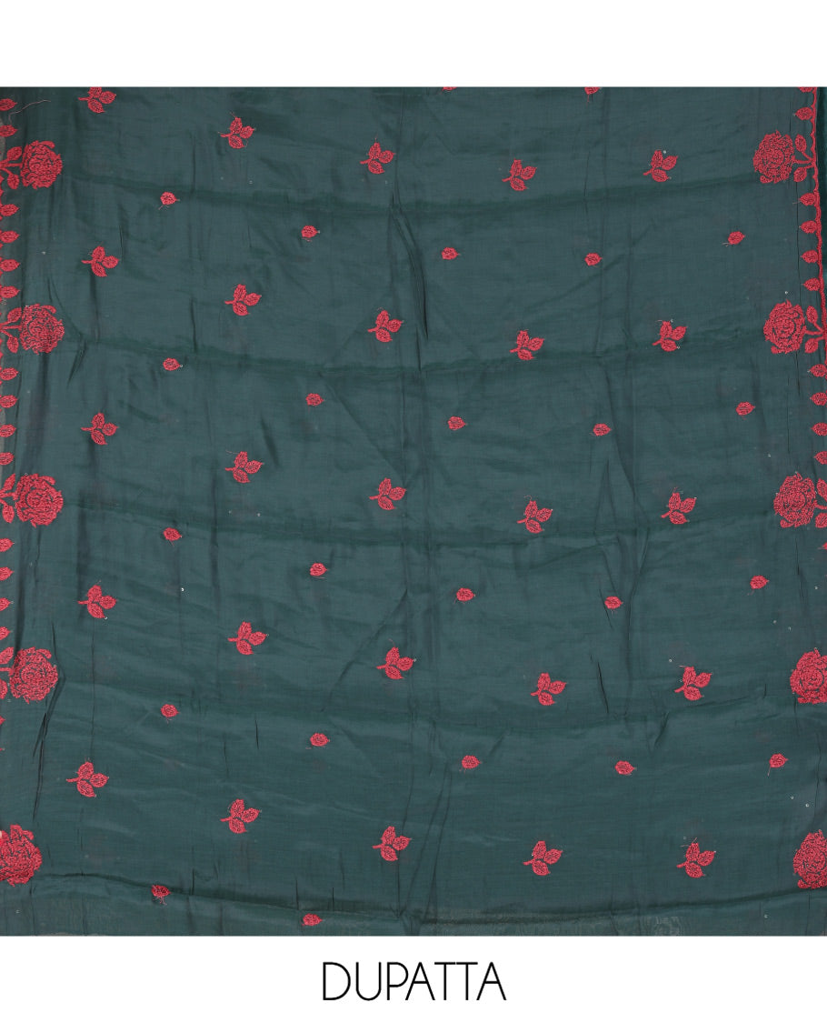 Bottel Green Mul Chanderi Material Churidar Features Floral Vine Embroidery Top, a Plain Bottom, and a Embroidered Dupatta