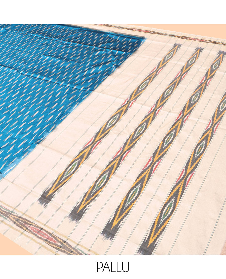 Blue Pochampally Ikat Silk Saree, Ornamented with Ikat Buttas, Complemented by a Contrast Ikat Border, Ikat-Style Pallu, and No Blouse