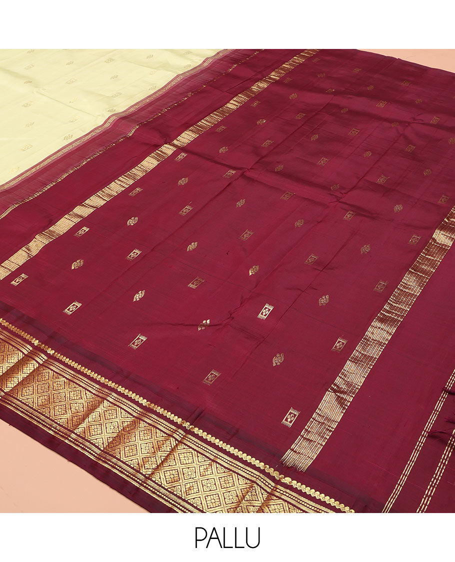 Light Green Kanchipuram Silk Saree, Delicately Woven with Zari Buttas on Its Body, Complemented by a Contrast One-Sided Border of Salngai, Banaras, Muthu, and Jaal Designs, Pallu of Zari Designs, and Comes Without a Blouse
