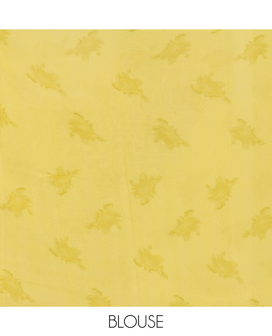 Yellow georgette saree with contrast floral design border