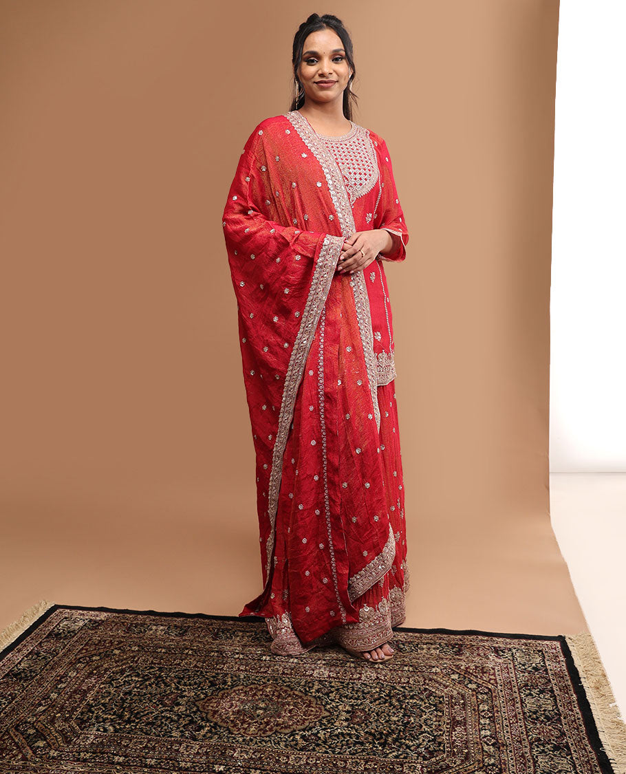 Red floral embroidery round neck, 3/4 th sleeve , knee length with sharara pants & embroidered dupatta