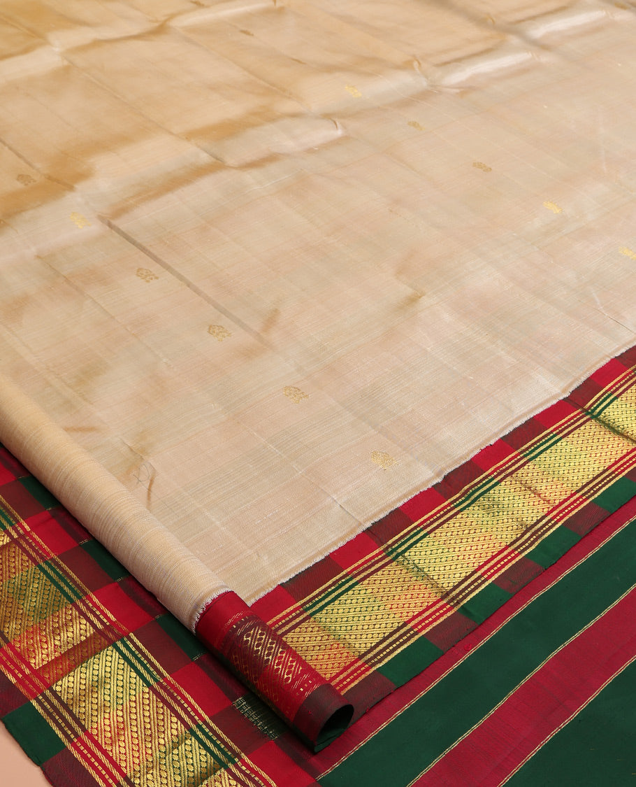 Sandal Kanchipuram Silk Saree, Sparsely Woven with Zari Buttas, a Contrast Korvai One-sided Border of Traditional Designs, Zari Woven Pallu, and No Blouse