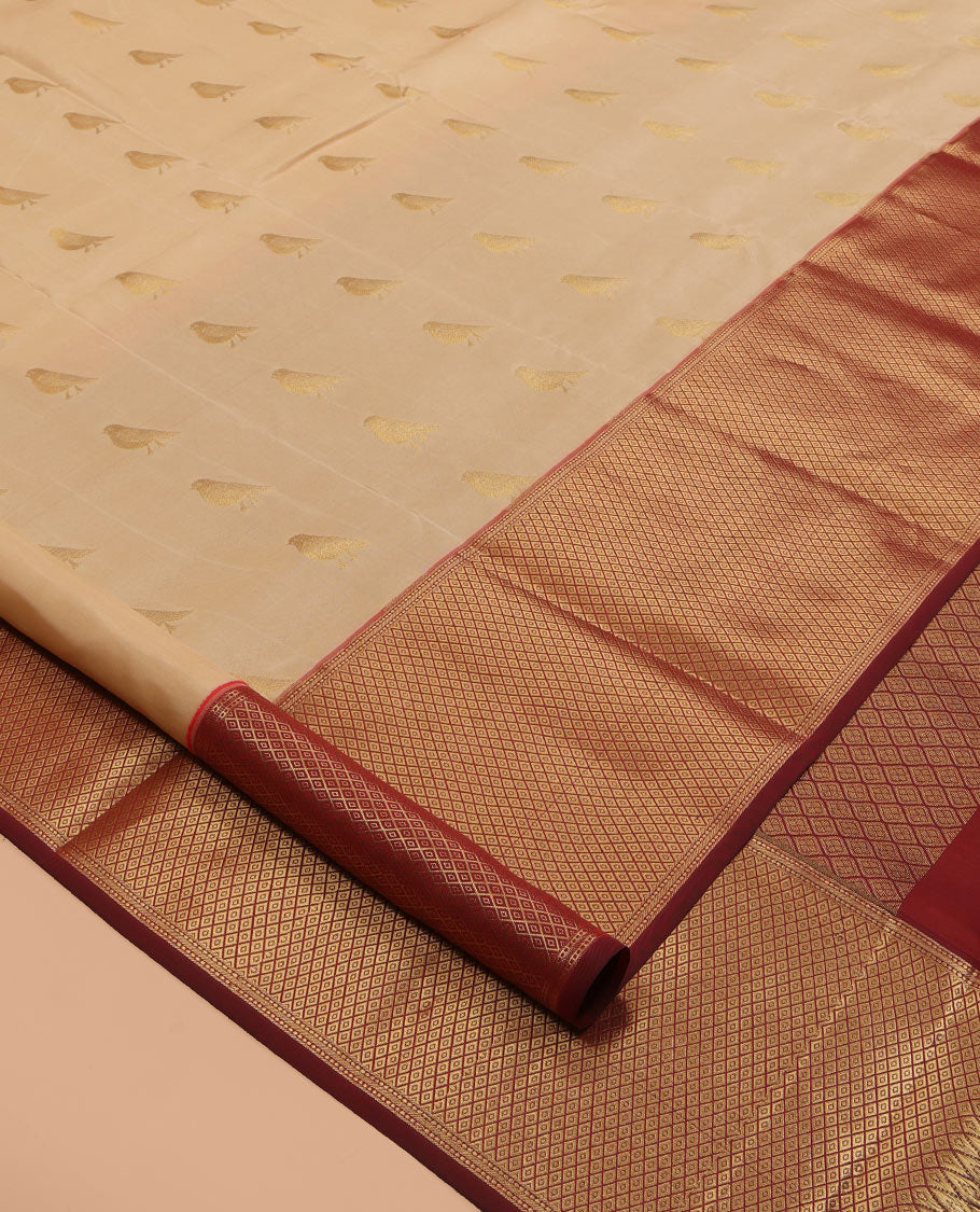 Sandal Vasundhara Lite Silk Mix Saree, Adorned with Pakshi Buttas, a Contrast Mayil Kann Border, Grand Pallu, and a Contrast Blouse