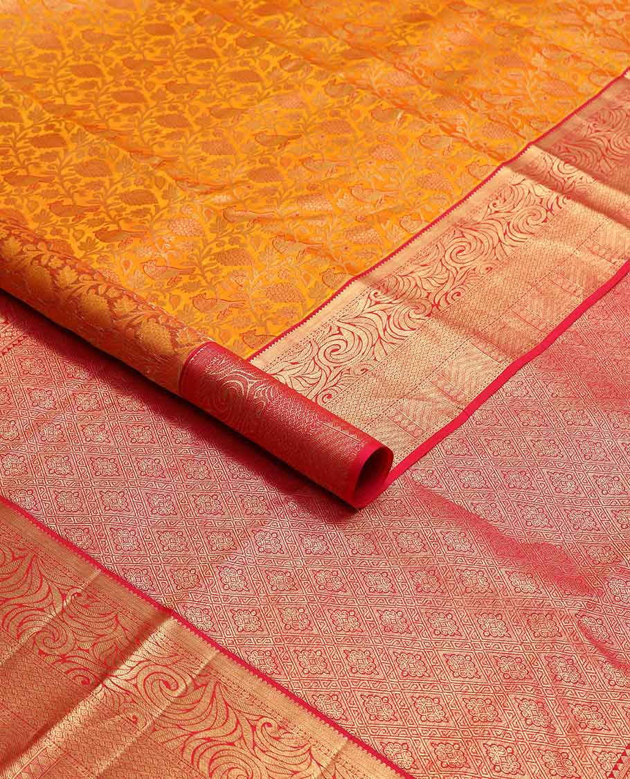 Orange floral jacqaurd kancheepuram silk saree with contrast intricate zari design border & checked floral design pallu