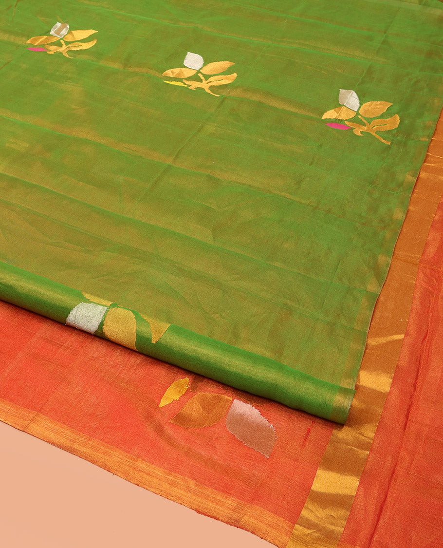 Borderless parrot green Uppada Silk Saree Artfully Detailed with Leaf Zari Buttas, Complemented by Contrast Pallu Steeped with Leaf Zari Designs, and Paired with a Contrast Blouse