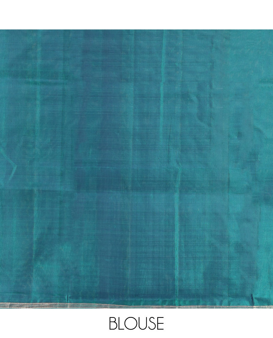 Peacock Blue Mayuri Lite Silk Mix Saree, Highlighted by Zari Buttas, a Subtle Piping Border, Pallu Steeped with Geometric Designs, and a Matching Blouse