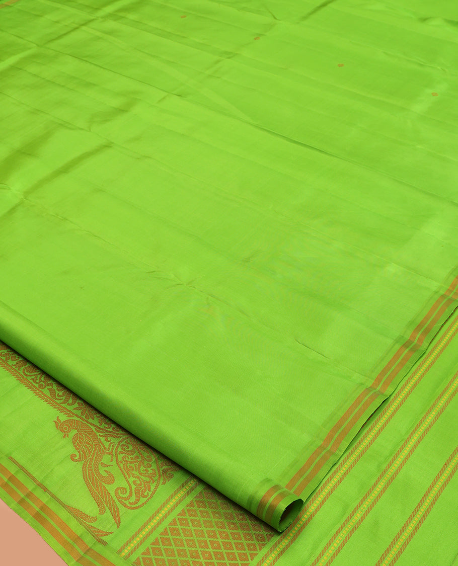 Green Kanchipuram Silk Saree, Subtly Woven with Buttas, a Piping Border, Pallu of Peacock Designs, and a Matching Blouse