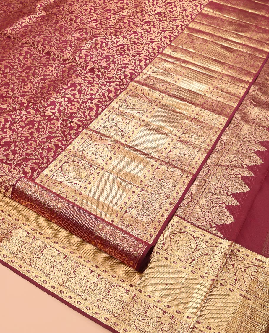 Maroon Kanchipuram Wedding Silk Saree, Enriched with Jacquard Design, a Zari Border of Traditional Designs, Intricately Designed Pallu, and a Matching Blouse
