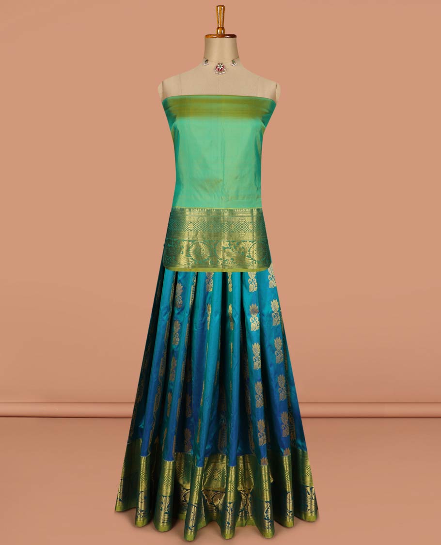 Blue pure-silk half-saree, zari buttas with contrast mayil chakra bordered skirt, contrast zari design blouse, and mat textured dhavani