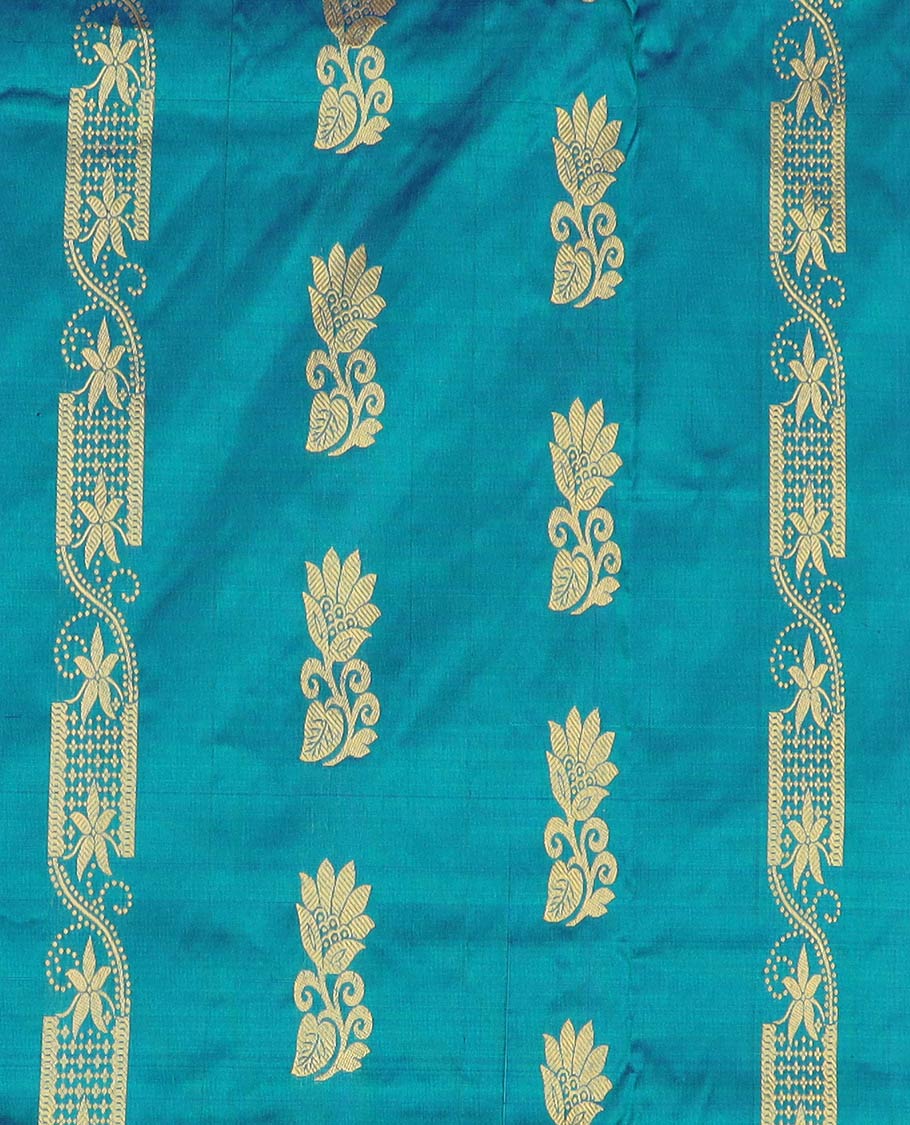Blue pure-silk half-saree, zari buttas with contrast mayil chakra bordered skirt, contrast zari design blouse, and mat textured dhavani