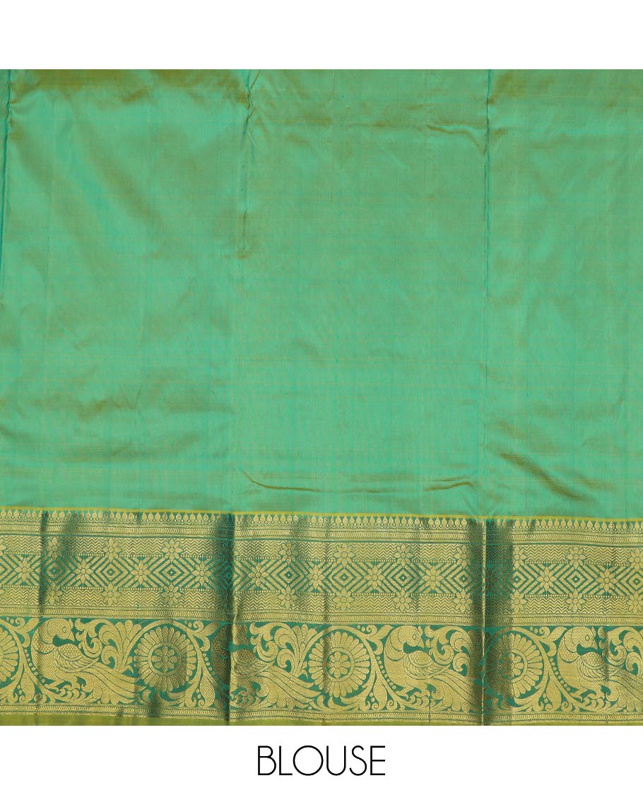 Blue pure-silk half-saree, zari buttas with contrast mayil chakra bordered skirt, contrast zari design blouse, and mat textured dhavani