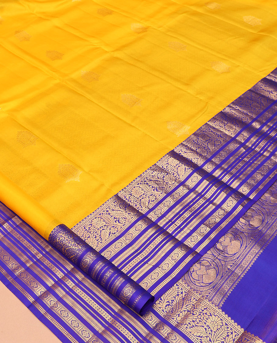 Yellow Vasundhara Silk Saree, Subtly Woven with Zari Buttas, a Contrast Border of Kodi Visiry, Muthu, and Kamalam Designs, Jaal Pallu, and a Contrast Blouse
