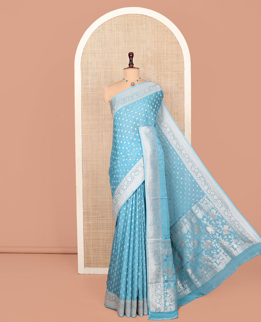 Blue Fancy Crepe Saree, Finely Woven with Buttas, Highlighted by a Floral Creeper Border, Floral Designs Woven Pallu, and a Matching Blouse