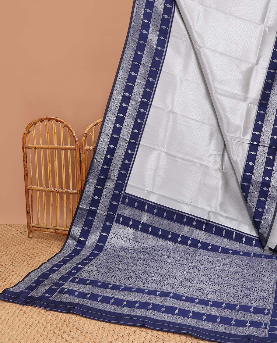 Grey floral jacquard litchi silk saree with contrast floral design border & intricate floral zari design pallu