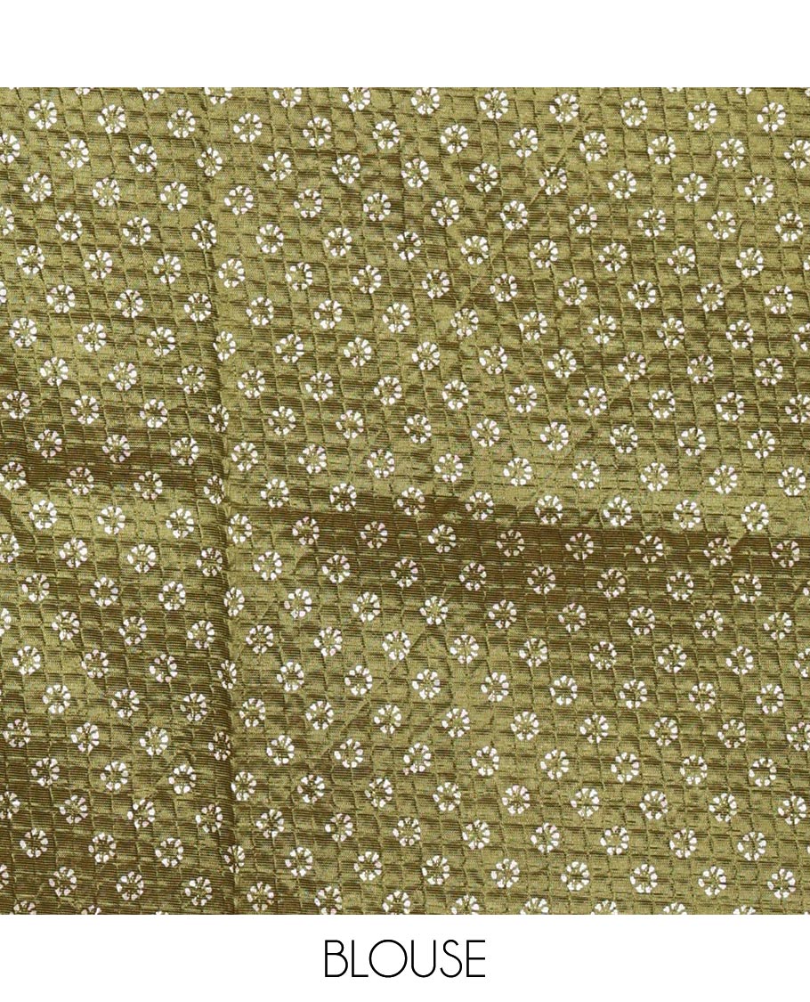 Olive green batik-style tree motif printed litch crushed saree, leaf print border, floral-geometric print pallu & floral print blouse