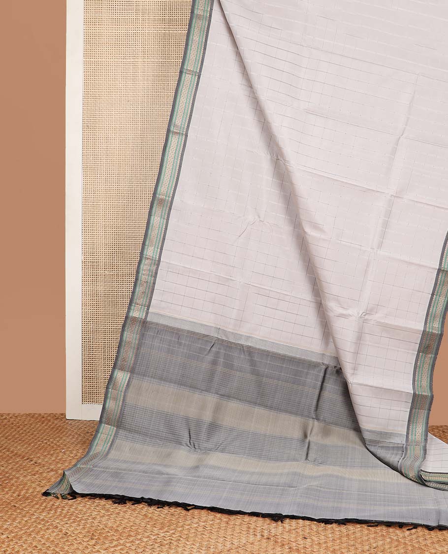 Light grey checked kancheepuram silk saree with contrast intricate design border & striped pallu