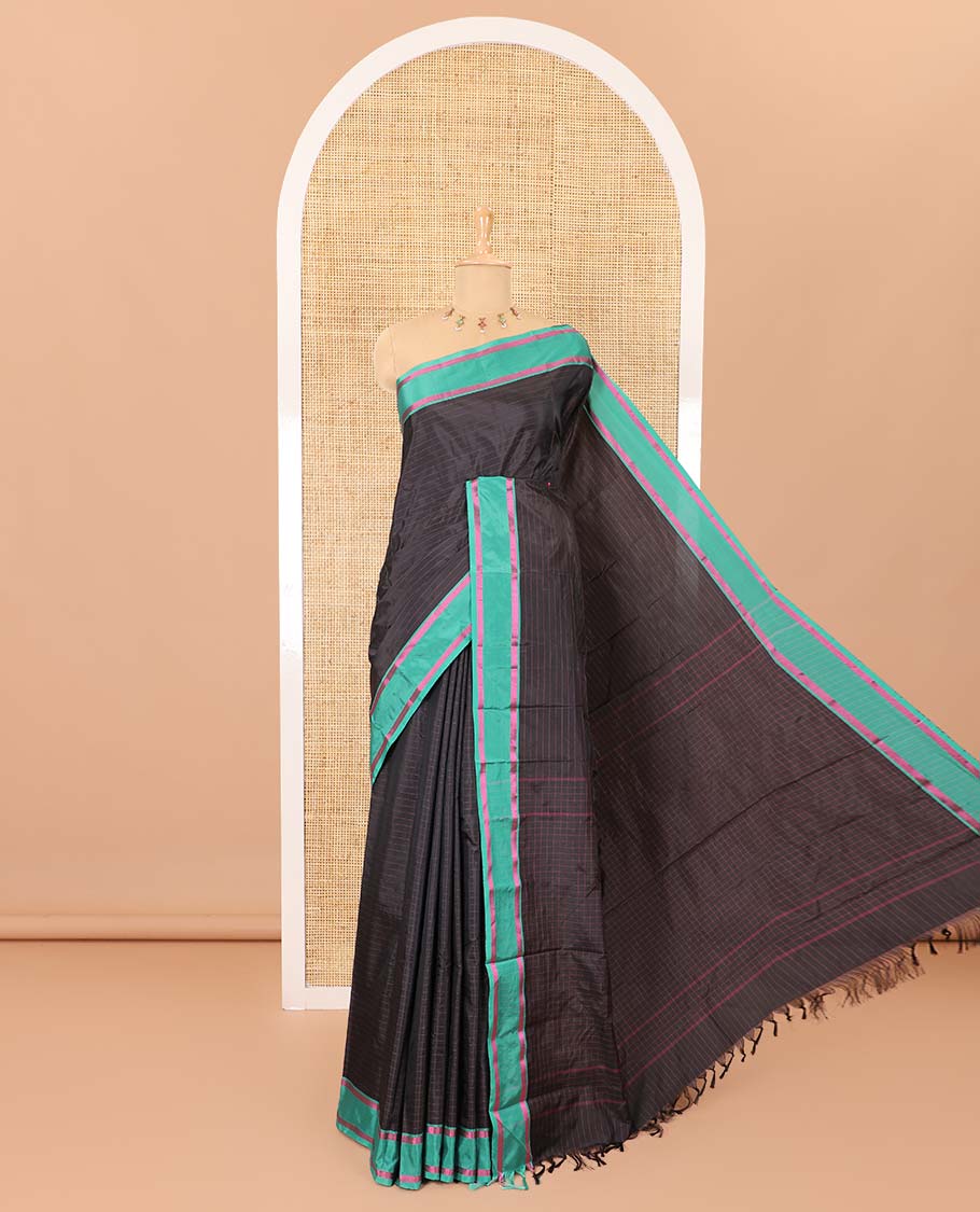 Black horizontal striped semi-soft silk saree, contrast satin striped border, striped pallu, and a matching blouse