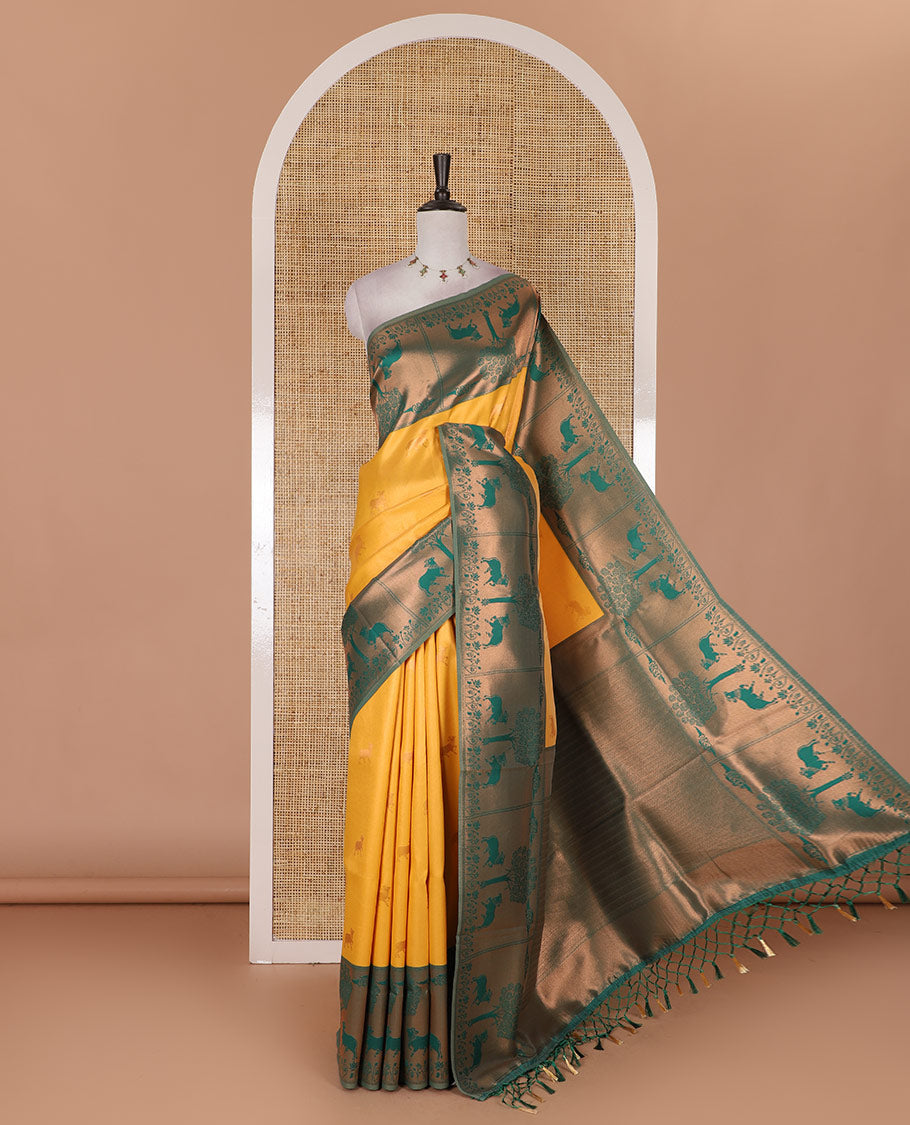Yellow Pichwai cow zari motifs, Kanchi tissue saree, contrast Pichwai cow motifs copper zari woven border, zari-rich pallu, and contrast zari design blouse