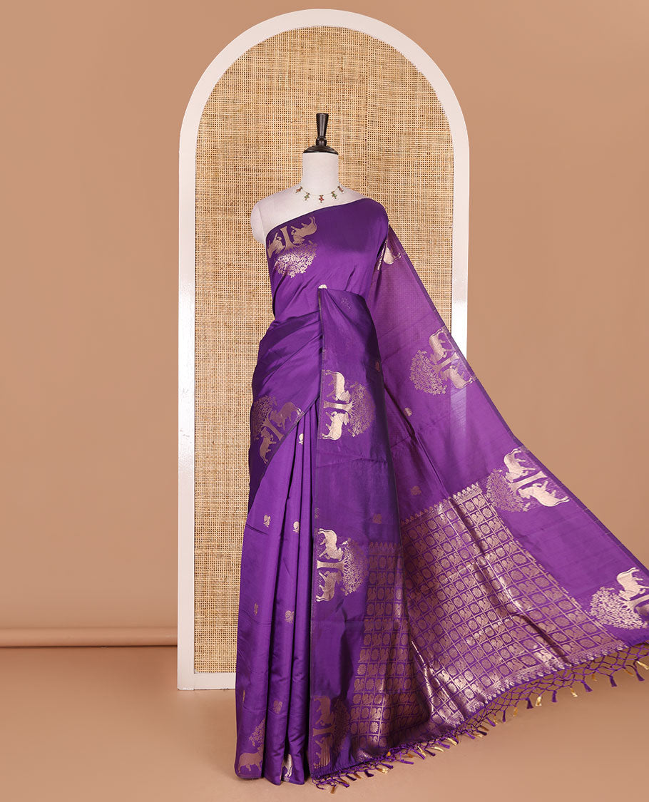 Borderless violet peacock, chakra, and pichwai cow buttas zari woven kanchi silk saree, peacock and chakra enclosed checked pallu, and matching blouse
