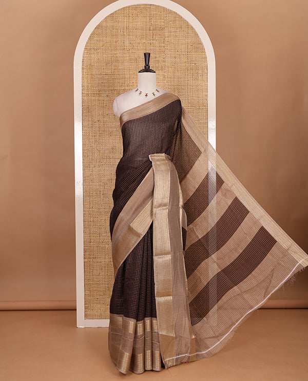 Brown Checked saree with contrast zari border and contrast striped pallu along with contrast blouse