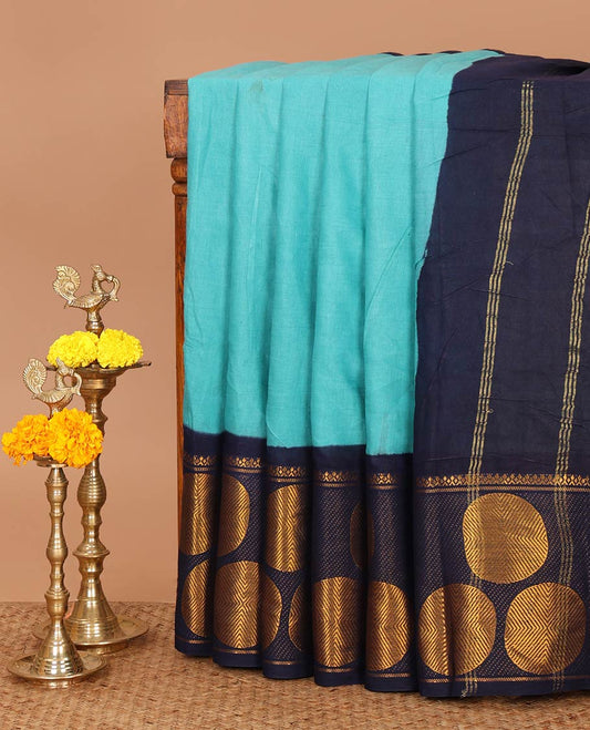 Light blue full-plain sungudi cotton saree, contrast zari round motif big border, lining seer pallu & plain dark blue blouse