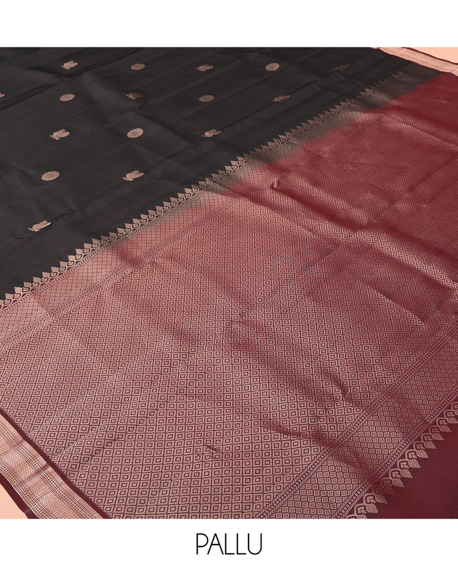 Black Vasundhara Lite Silk Mix Saree, Mesmerized with Mayil Buttas, a Contrast Border of Thilakam Mokku, Muthu, Lavangam, and Neli Designs, Jaal Pallu, and a Contrast Blouse
