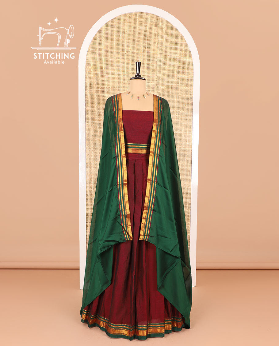 Maroon half-saree, plain with contrast traditional zari border skirt, matching zari bordered blouse, and contrast plain zari border dhavani