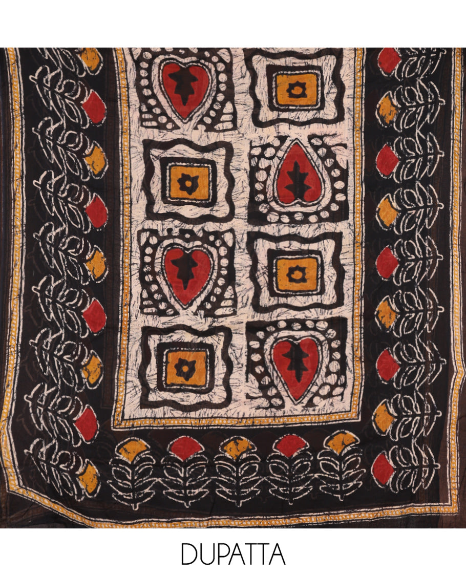 Black-Yellow Mul Cotton Material Chudidar, Batik Printed Top, a Contrast Bottom, and Batik Print Dupatta