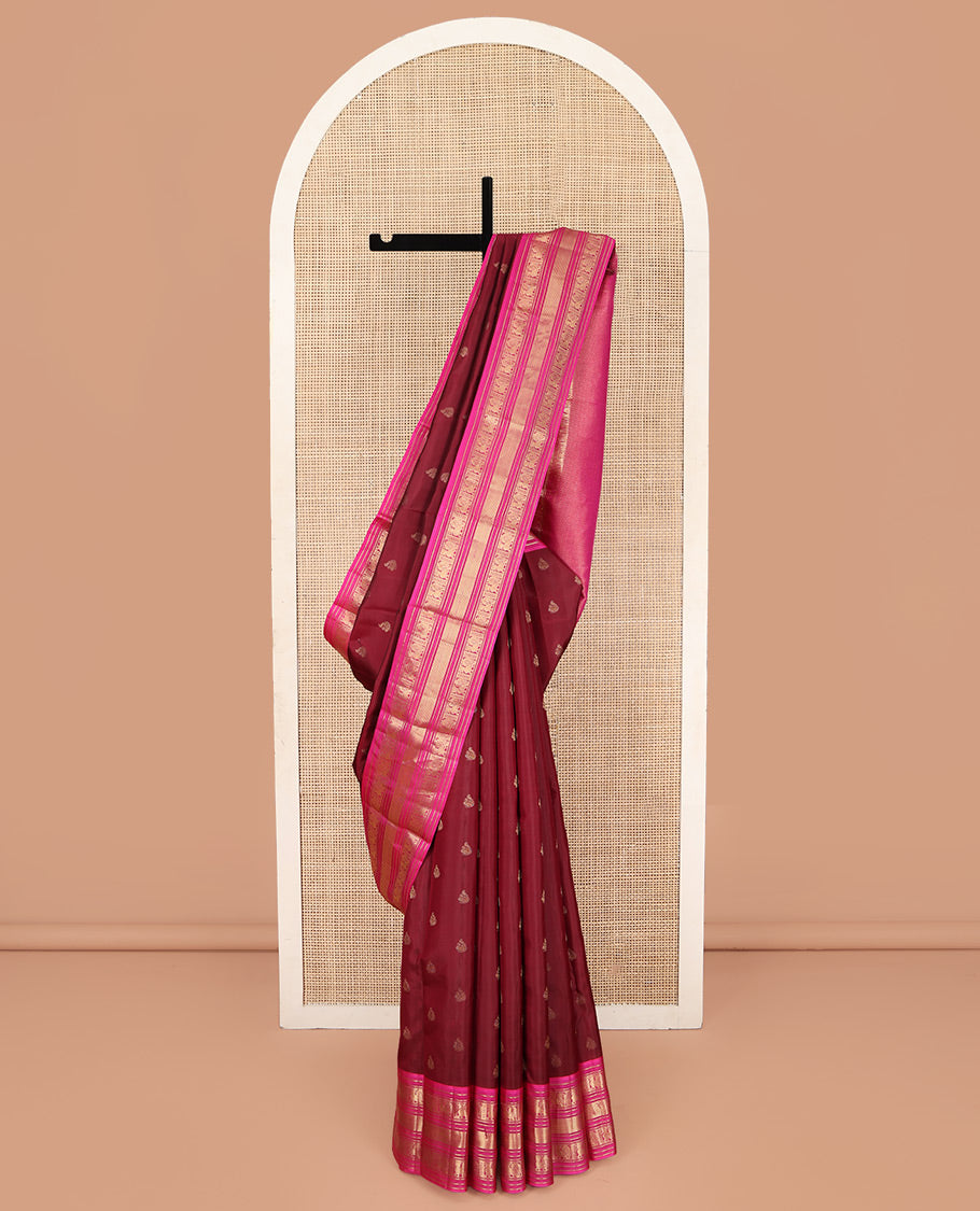 Red Kanchipuram Silk Saree, Opulently Embellished with Mayil Buttas on Its Body, Complemented by Contrast Border of Kathir, and Mayil Designs, Pallu Depicting Mayil Kann Designs, and Paired with a Contrast Blouse