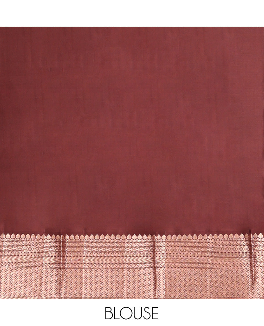 Redwood Colored Vasundhara Silk Saree, Spotlighted with Zari Buttas on Its Body, Complemented by Contrast Border of Thilakam Mokku, Diamond, Rettai Neli, and Kathir Designs, Intricately Designed Pallu, and Paired with a Contrast Blouse