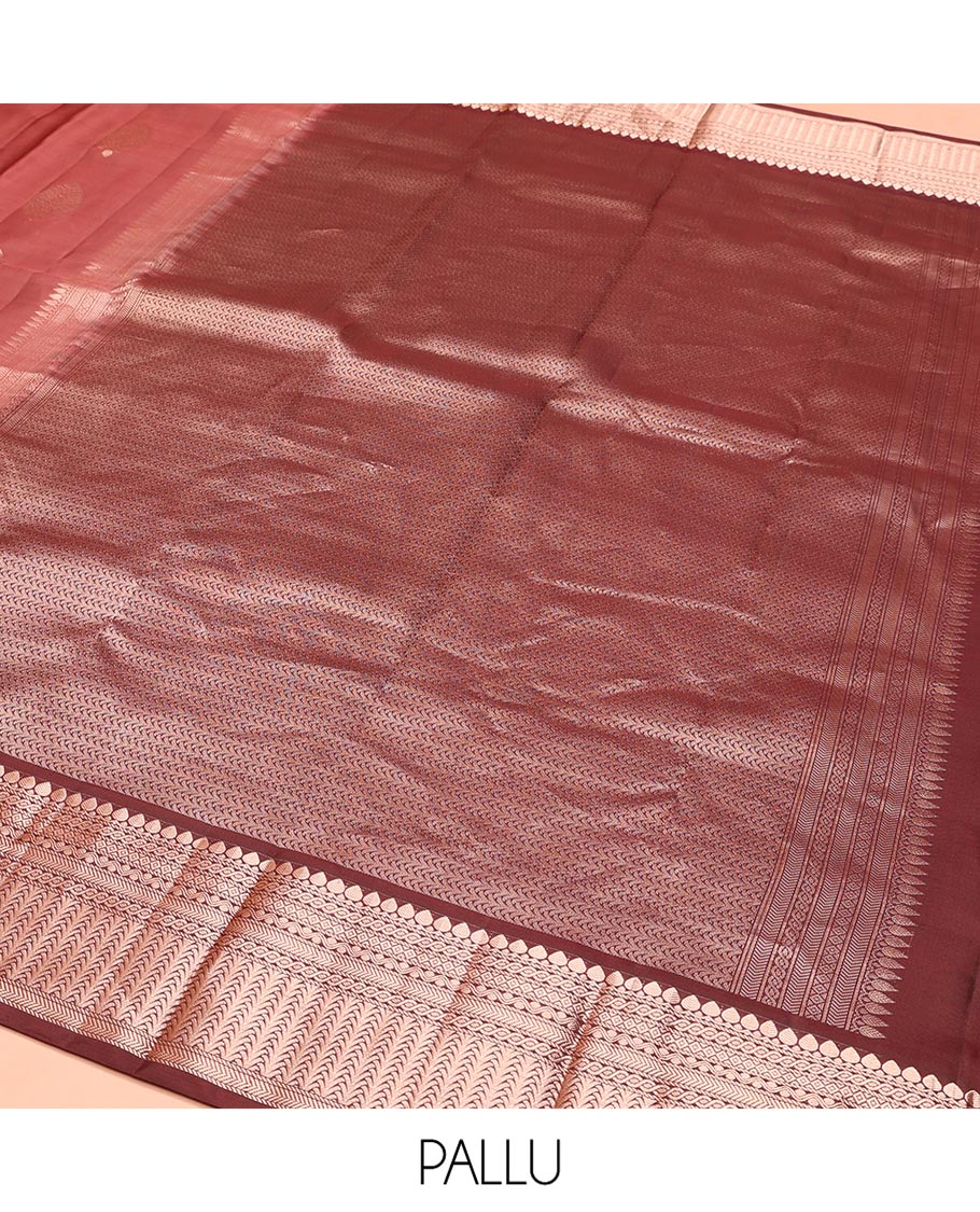 Redwood Colored Vasundhara Silk Saree, Spotlighted with Zari Buttas on Its Body, Complemented by Contrast Border of Thilakam Mokku, Diamond, Rettai Neli, and Kathir Designs, Intricately Designed Pallu, and Paired with a Contrast Blouse