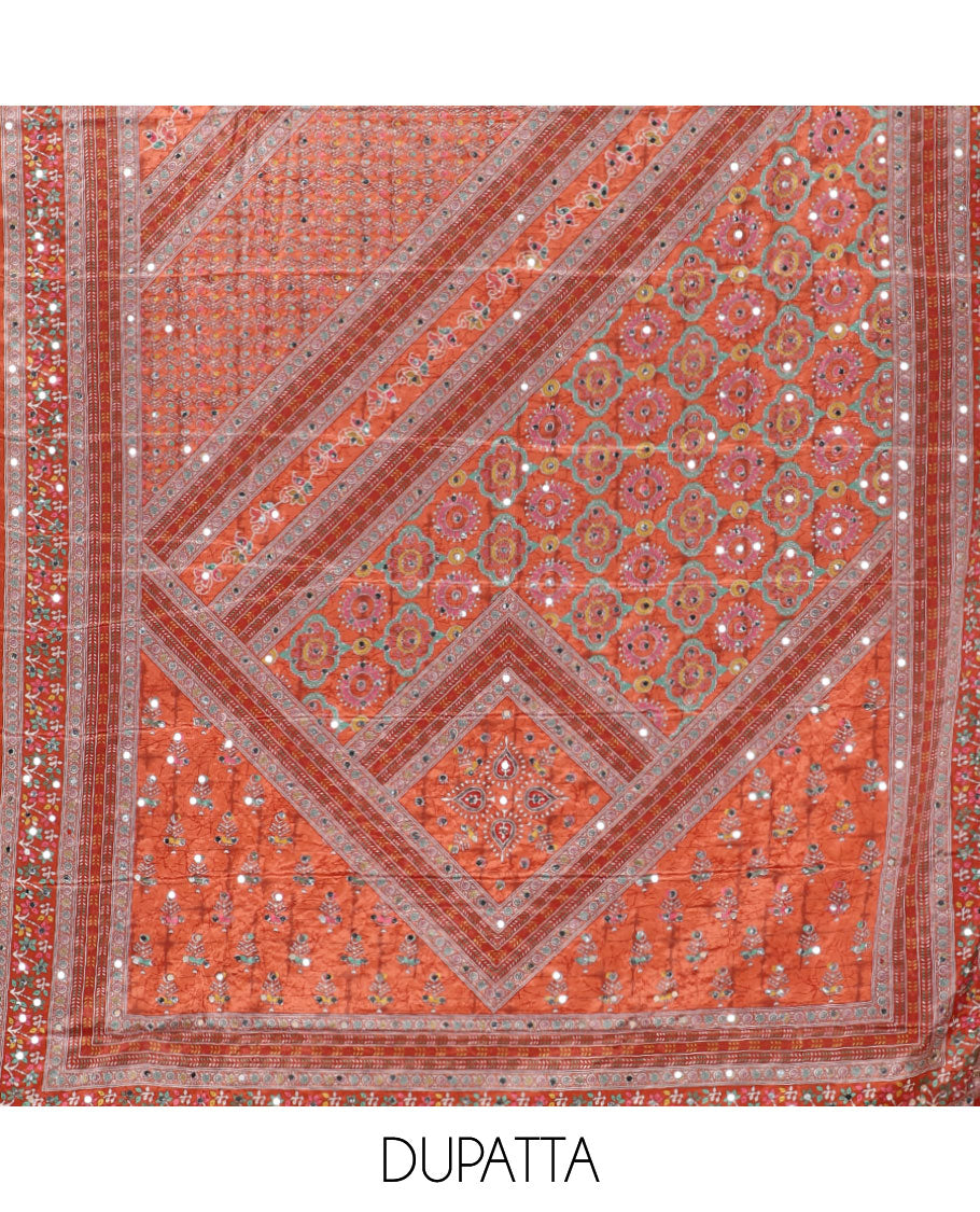 Orange material chudidar set, floral-theme batik printed with mirror embroidered crepe top, santoon bottom, and Chinon dupatta of print, and mirror embroidery