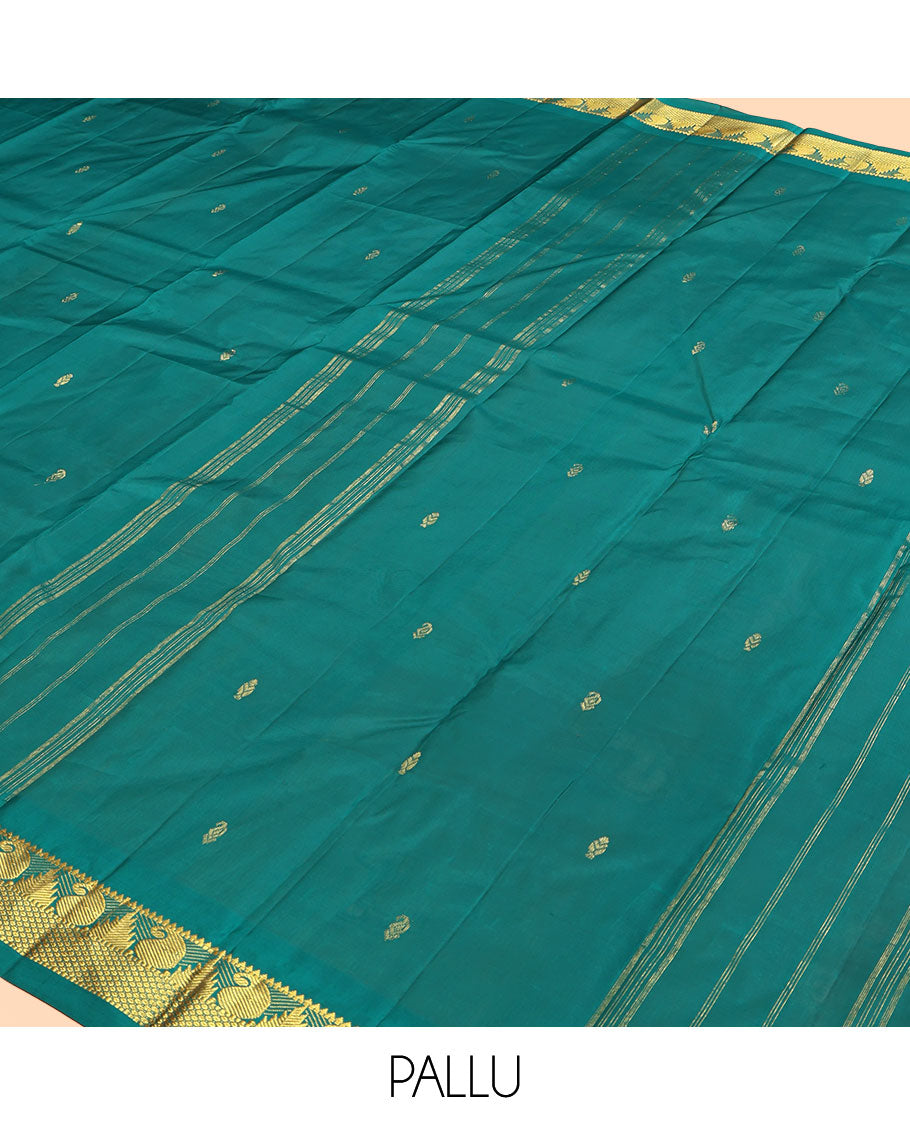Green Kanchipuram Silk Saree, Woven with Zari Buttas, Highlighted by Zari Border of Rekku, Muthu, Manga, and Mayil Kann Designs, Pallu of Zari Design, and a Matching Blouse